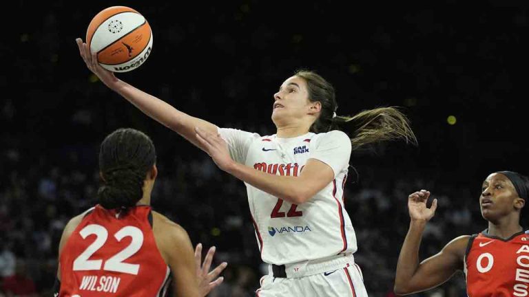 Washington Mystics guard Sonia Citron shoots over Las Vegas Aces center A'ja Wilson, left, during the first half of a WNBA basketball game Thursday, June 26, 2025, in Las Vegas. (John Locher/AP)