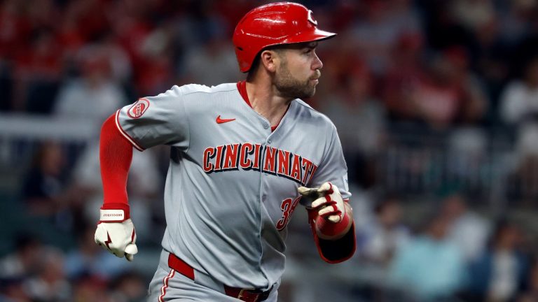 Cincinnati Reds' Austin Wynns runs after hitting a double during the seventh inning of a baseball game against the Atlanta Braves, Tuesday, May 6, 2025, in Atlanta. (AP Photo/Butch Dill)