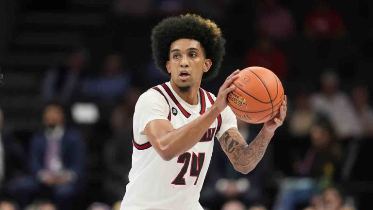 Louisville guard Chucky Hepburn brings the ball down court during the second half of an NCAA college basketball game against Clemson in the semifinals of the Atlantic Coast Conference tournament, Saturday, March 15, 2025, in Charlotte, N.C. (Chris Carlson/AP)