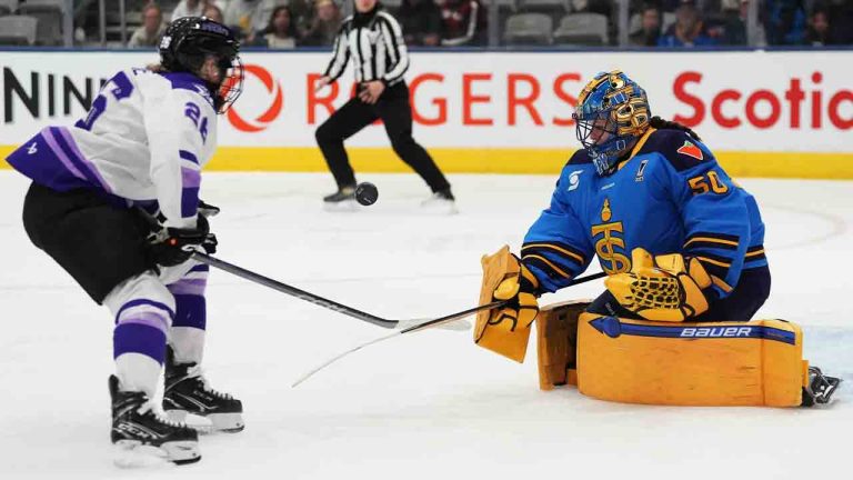 Toronto Sceptres goaltender Kristen Campbell (50) stops Minnesota Frost's Kendall Coyne Schofield (26) during first period PWHL playoff hockey action in Toronto on Friday, May 9, 2025. (Frank Gunn/CP)