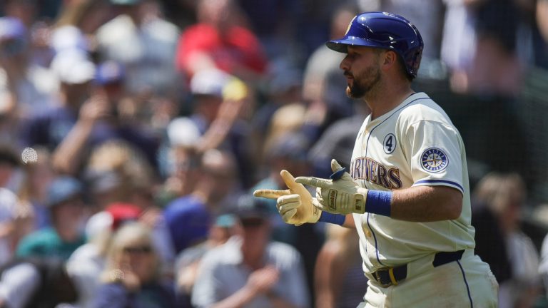 Seattle Mariners' Cal Raleigh celebrates after hitting a solo home run during the seventh inning of a game against the Minnesota Twins, Sunday, Jun 1, 2025, in Seattle. (Ryan Sun/AP)