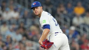 Toronto Blue Jays pitcher Jose Berrios checks on a Philadelphia Phillies runner on first base during third inning MLB action in Toronto on Wednesday June 4, 2025. (Chris Young)