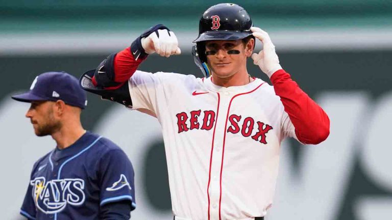 Boston Red Sox rookie Roman Anthony celebrates after his two RBI double, his first major league hit, during the first inning of a baseball game against the Tampa Bay Rays at Fenway Park, Tuesday, June 10, 2025, in Boston. (Charles Krupa/AP)