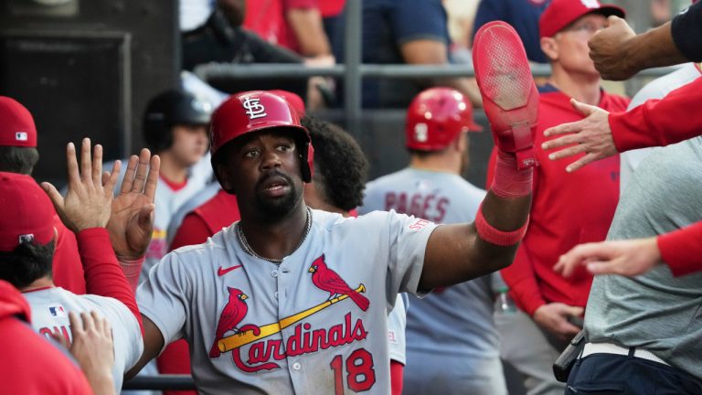 St. Louis Cardinals' Jordan Walker celebrates with teammates after scoring on a one-run single by Nolan Arenado during the 10th inning in the second game of a doubleheader against the Chicago White Sox Thursday, June 19, 2025. (Nam Y. Huh/AP)