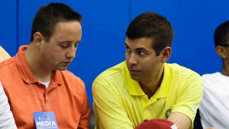 Boston Celtics director of player personnel Austin Ainge, left, talks with head coach Brad Stevens during an NBA summer league basketball game between the Celtics and the Detroit Pistons, Monday, July 8, 2013, in Orlando, Fla. (John Raoux/AP)