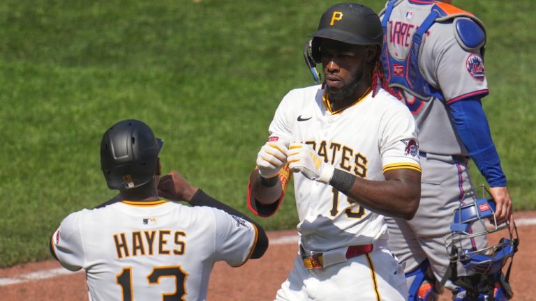 Pittsburgh Pirates' Oneil Cruz celebrates with Ke'Bryan Hayes after both scored on his two-run home run off New York Mets pitcher Dedniel Núñez during the seventh inning of a baseball game in Pittsburgh, Sunday, June 29, 2025. (AP/Gene J. Puskar)