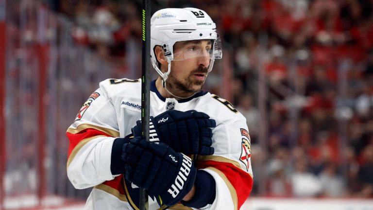Florida Panthers' Brad Marchand (63) waits for a face-off against the Carolina Hurricanes during the first period of Game 2 of the NHL hockey Stanley Cup Eastern Conference finals in Raleigh, N.C., Thursday, May 22, 2025. (Karl DeBlaker/AP)