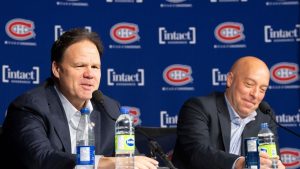 Montreal Canadiens executive president Jeff Gorton, left, and general manager Kent Hughes speak to the media during their end of season news conference in Montreal on Monday, May 5, 2025. (Christinne Muschi/CP)