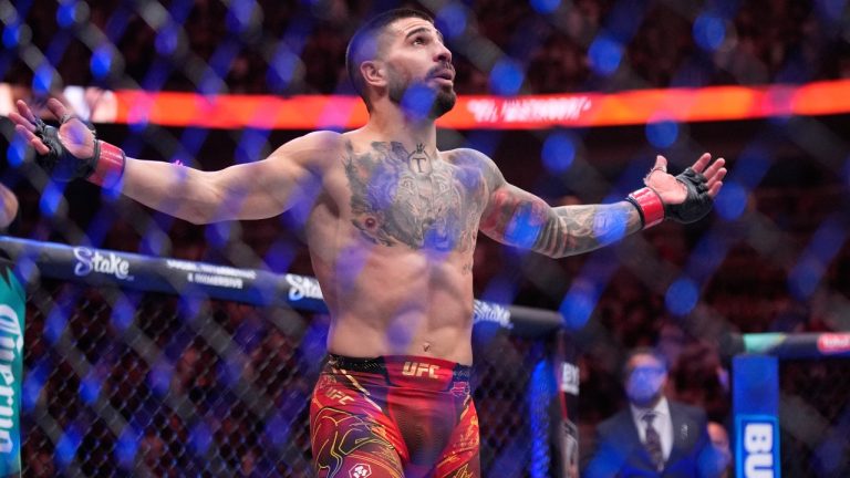 Ilia Topuria celebrates after defeating Charles Oliveira in a lightweight title fight at UFC 317, Saturday, June 28, 2025, in Las Vegas. (John Locher/AP)
