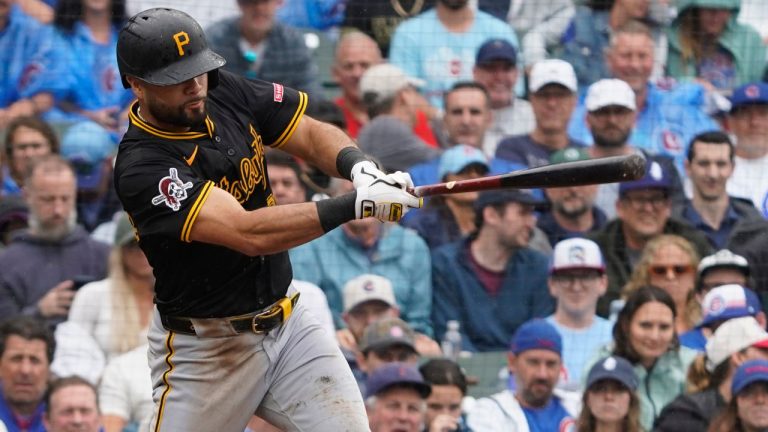 Pittsburgh Pirates' Isiah Kiner-Falefa hits a one-run sacrifice fly during the 10th inning of a baseball game against the Chicago Cubs, Friday, June 13, 2025, in Chicago. (David Banks/AP)