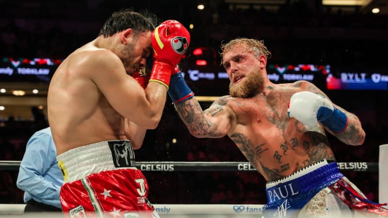 Jake Paul, right, punches Julio Cesar Chavez Jr. during their cruiserweight boxing match on Saturday, June 28, 2025, in Anaheim, Calif. (Etienne Laurent/AP)