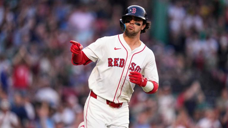 Boston Red Sox's Marcelo Mayer points towards the Red Sox dugout while rounding the bases on his solo home run during the second inning of a baseball game against the Tampa Bay Rays. (Charles Krupa/AP)