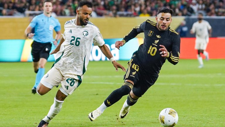Saudi Arabia defender Ali Majrashi (26) and Mexico forward Alexis Vega (10) chase after the ball during a CONCACAF Gold Cup quarterfinal soccer match, Saturday, June 28, 2025, in Glendale, Ariz. (Samantha Chow/AP)