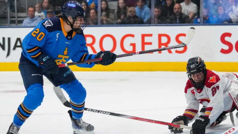 Toronto Sceptres' Sarah Nurse shoots to score a goal while being defended against by Ottawa Charge's Ashton Bell during second period PWHL action in Toronto on Saturday, May 3, 2025. (THE CANADIAN PRESS/Arlyn McAdorey)