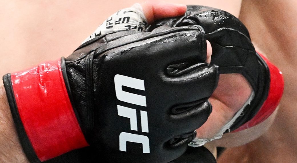 A-close-up-view-of-UFC-gloves-during-a-mixed-martial-arts-bout