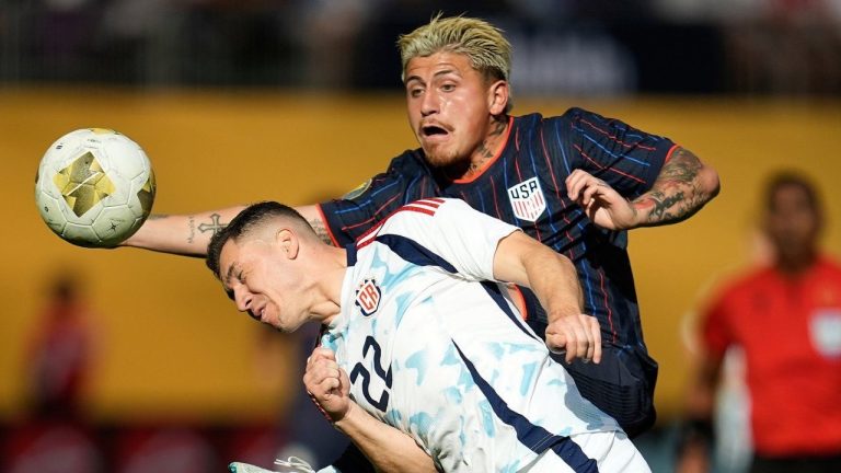 Costa Rica midfielder Carlos Andrei Mora Montoya and United States midfielder Diego Angel Luna battle for possession of the ball during the first half of a Concacaf Gold Cup quarterfinals match Sunday, June 29, 2025, in Minneapolis. (AP/Abbie Parr)