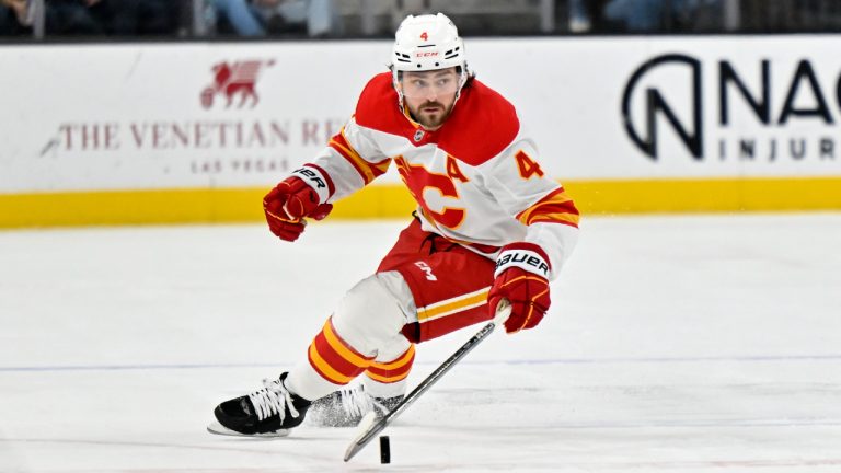 Calgary Flames defenceman Rasmus Andersson handles the puck against the Vegas Golden Knights during the third period of an NHL hockey game Sunday, Dec. 29, 2024, in Las Vegas. (David Becker/AP)