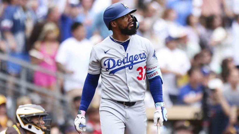 Los Angeles Dodgers' Teoscar Hernandez, right, watches his three-run home run as San Diego Padres' Martin Maldonado looks on in the sixth inning of a baseball game Wednesday, June 11, 2025, in San Diego. (Derrick Tuskan/AP)