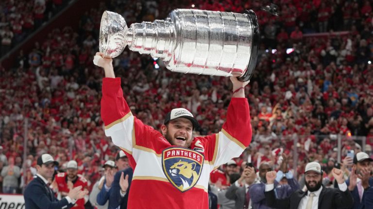 Florida Panthers captain Aleksander Barkov (16) raises the Stanley Cup after defeating the Edmonton Oilers in Game 6 of the NHL hockey Stanley Cup Final Tuesday, June 17, 2025, in Sunrise, Fla. (Lynne Sladky/AP)