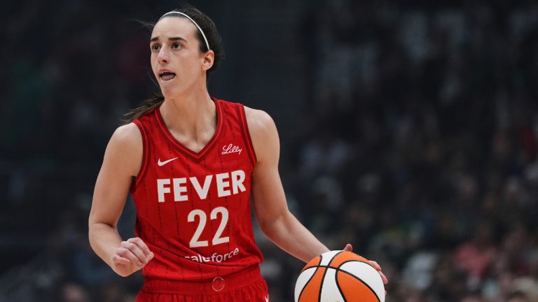 Indiana Fever guard Caitlin Clark moves the ball against the Seattle Storm during the first half of a WNBA basketball game Tuesday, June 24, 2025, in Seattle. (Lindsey Wasson/AP)