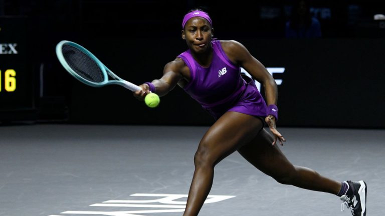Coco Gauff of the U.S. plays a shot against China's Qinwen Zheng during their women's singles final match of the WTA finals at the King Saud University Indoor Arena, in Riyadh, Saudi Arabia, Saturday, Nov. 9, 2024. (AP Photo)