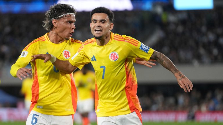 Colombia's Luis Diaz, right, celebrates scoring his side's opening goal against Argentina during a qualifying soccer match for the FIFA World Cup 2026 at the Monumental stadium in Buenos Aires, Argentina, Tuesday, June 10, 2025. (Gustavo Garello/AP)