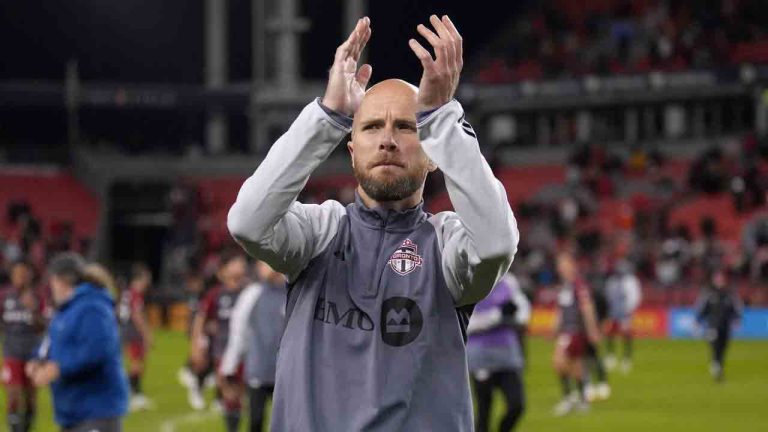 Toronto FC midfielder Michael Bradley (4) applauds to the crowd at the end of second-half MLS soccer action in Toronto on Saturday, Oct. 21, 2023. This was Bradley's final game of his MLS career. (Nathan Denette/CP)