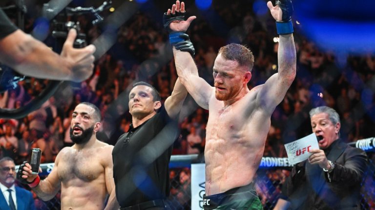 Jack Della Maddalena, right, reacts following his decision win over Belal Muhammad, left, following their UFC 315 mixed martial arts welterweight title bout in Montreal. (Graham Hughes/CP)