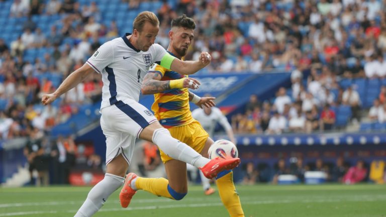 Andorra's Christian Garcia, right, tries to block a shot from England's Harry Kane during a World Cup 2026 group K qualifying soccer match between Andorra and England at the RCDE Stadium in Barcelona, Spain, Saturday, June 7, 2025. (Joan Monfort/AP)