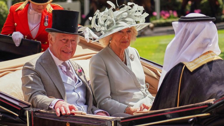 Britain's King Charles and Queen Camilla arrive by carriage into the Parade Ring on the first day of the Royal Ascot horse race meeting at Ascot, England, Tuesday, June 17, 2025. (Alberto Pezzali/AP)