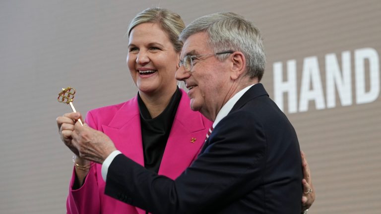 IOC President Thomas Bach, right, and President-elect Kirsty Coventry pose during the handover ceremony of the IOC Presidency at Olympic House in Lausanne, Switzerland, Monday, June 23, 2025. (Laurent Cipriani/AP)