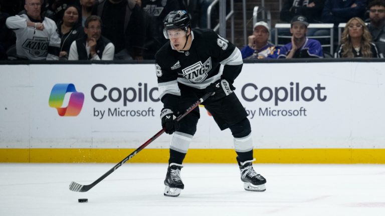 Andrei Kuzmenko (96) controls the puck during an NHL hockey game against the Winnipeg Jets, Tuesday, April 1, 2025, in Los Angeles. (Kyusung Gong/AP)