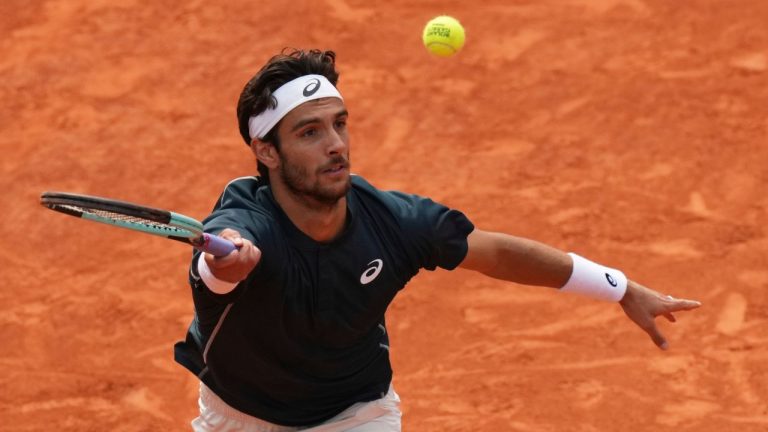 Italy's Lorenzo Musetti plays a shot against Frances Tiafoe of the U.S. during their quarterfinal match of the French Tennis Open at the Roland-Garros stadium in Paris, Tuesday, June 3, 2025. (Thibault Camus/AP)
