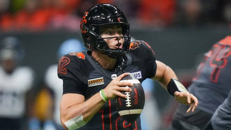 B.C. Lions quarterback Nathan Rourke runs the ball into the end zone to score a touchdown against the Toronto Argonauts during the first half of a CFL football game, in Vancouver, on Friday, September 13, 2024. (Darryl Dyck/THE CANADIAN PRESS)