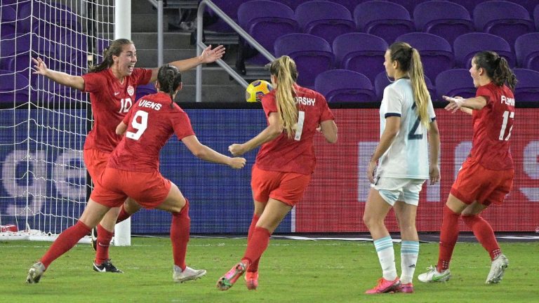 Canada midfielder Sarah Stratigakis (10) celebrates with teammates after scoring a goal during the second half of a SheBelieves Cup soccer match against Argentina, Sunday, Feb. 21, 2021, in Orlando, Fla. (Phelan M. Ebenhack/AP)