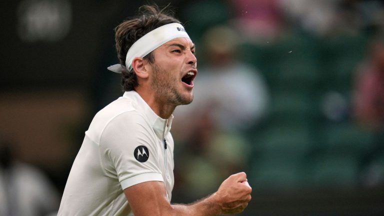 Taylor Fritz of the U.S. reacts during his first round men's single match against Giovanni Mpetshi Perricard of France at the Wimbledon Tennis Championships in London, Monday, June 30, 2025. (Kin Cheung/AP)