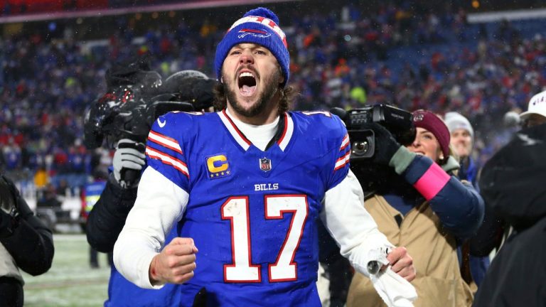 Buffalo Bills quarterback Josh Allen (17) celebrates a victory following the second half of an NFL football divisional playoff game against the Baltimore Ravens in Orchard Park, N.Y., Sunday Jan. 19, 2025. (Jeffrey T. Barnes/AP)