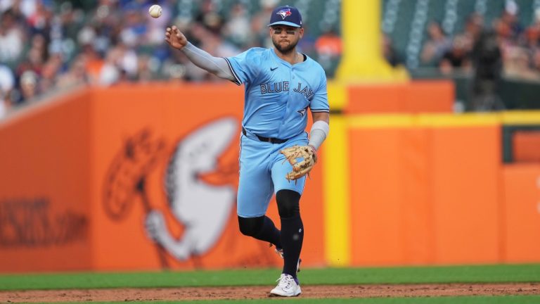 Toronto Blue Jays shortstop Bo Bichette throws to first base for an out on a Detroit Tigers' Gleyber Torres ground ball in the third inning during a baseball game, Thursday, July 24, 2025, in Detroit. (Paul Sancya/AP)
