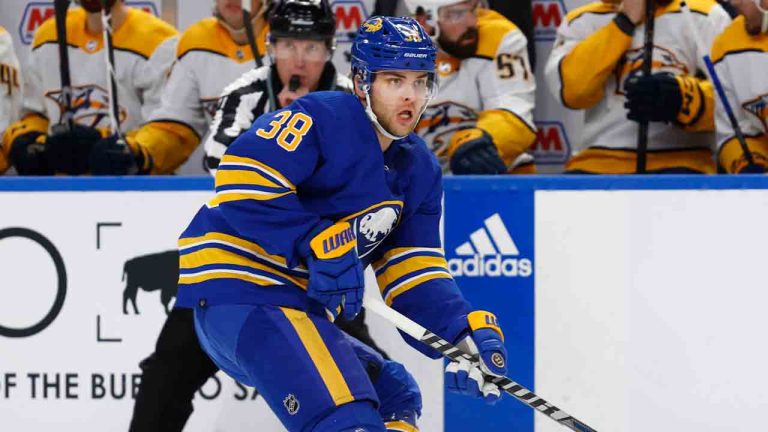 Buffalo Sabres defenseman Kale Clague (38) controls the puck during the first period of an NHL hockey game against the Nashville Predators, Tuesday, March 21, 2023, in Buffalo, N.Y. (Jeffrey T. Barnes/AP)