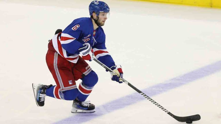 New York Rangers' Zac Jones skates with the puck during the third period of an NHL hockey game against the Edmonton Oilers Sunday, March 16, 2025, in New York. (Pamela Smith/AP)