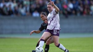 Halifax Tides' Saorla Miller, front right, and Vancouver Rise's Jaylyn Wright vie for the ball during the first half of an NSL match, in Burnaby, B.C., on Monday, May 5, 2025. (Darryl Dyck/CP)