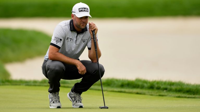 Corey Conners, of Canada, lines up a putt on the eighth hole during the third round of the U.S. Open tournament at Oakmont Country Club Saturday, June 14, 2025, in Oakmont, Pa. (Carolyn Kaster/AP)