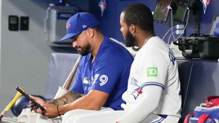 Toronto Blue Jays Hitting Coach David Popkins reviews work with Vladimir Guerrero Jr.as they sit in the dug out during MLB baseball action against Chicago White Sox in Toronto on Sunday June 22, 2025. (Chris Young/CP)