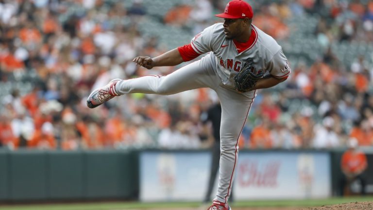 Los Angeles Angels pitcher Hector Neris follows through on his throw during the eighth inning of a baseball game against the Baltimore Orioles in Baltimore, Saturday, June 14, 2025. (AP Photo/Terrance Williams)