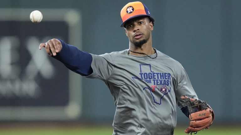 Houston Astros second baseman Brice Matthews (28) warms up before a baseball game against the Texas Rangers, Friday, July 11, 2025, in Houston. (AP Photo/Kevin M. Cox)