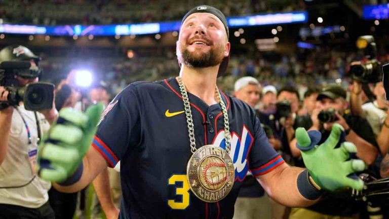 Seattle Mariners' Cal Raleigh celebrates after winning the MLB baseball All-Star Home Run Derby, Monday, July 14, 2025, in Atlanta. (Mike Stewart/AP)