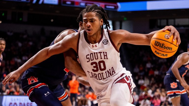 South Carolina forward Collin Murray-Boyles (30) drives on Auburn forward Johni Broome (4) during the second half of an NCAA college basketball game on Tuesday, Jan. 14, 2025, in Columbia, S.C. (AP Photo/Scott Kinser)