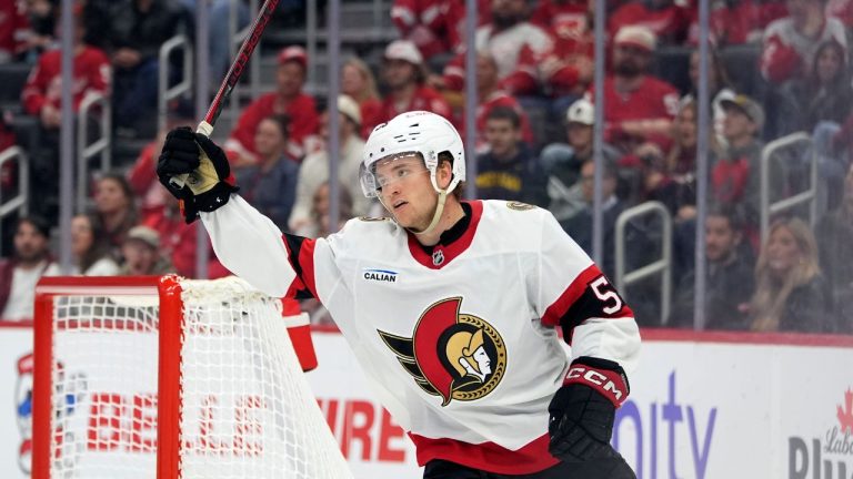 Ottawa Senators left wing Angus Crookshank (59) celebrates a goal by teammate Adam Gaudette during the third period of an NHL preseason hockey game, Friday, Oct. 4, 2024, in Detroit. (Carlos Osorio/AP)
