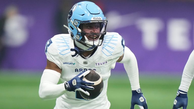 DaShaun Amos (8) runs back an interception against the Winnipeg Blue Bombers during second half CFL football action at the 111th Grey Cup in Vancouver on Sunday, November 17, 2024. (Frank Gunn/CP)