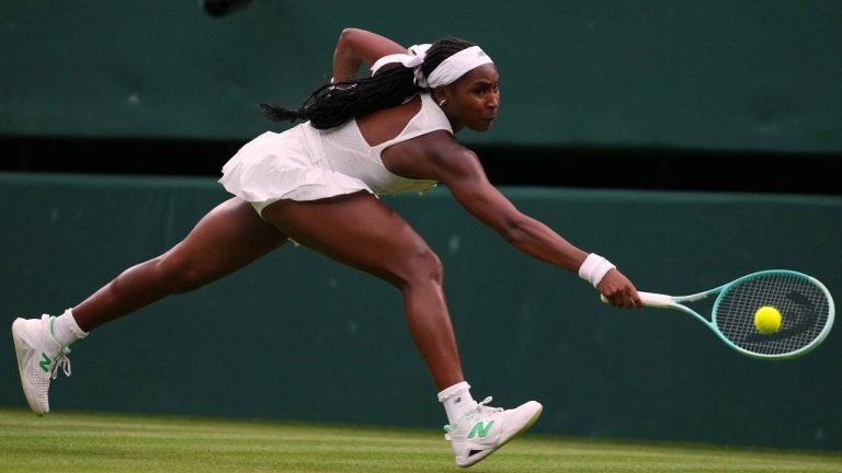 Coco Gauff of the U.S. returns the ball to Dayana Yastremska of Ukraine during their first round women's single match at the Wimbledon Tennis Championships. (Kirsty Wigglesworth/AP)